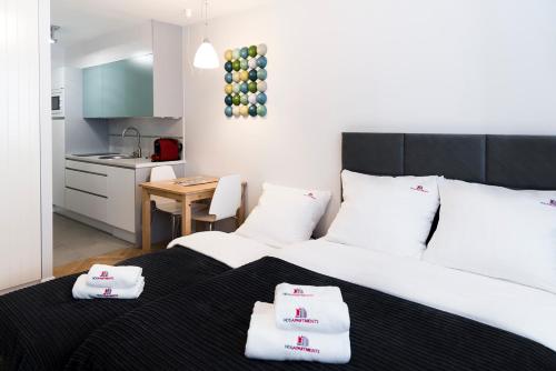 Imagen de la habitación del Apartamentos Hosapartments City Center. Foto 10