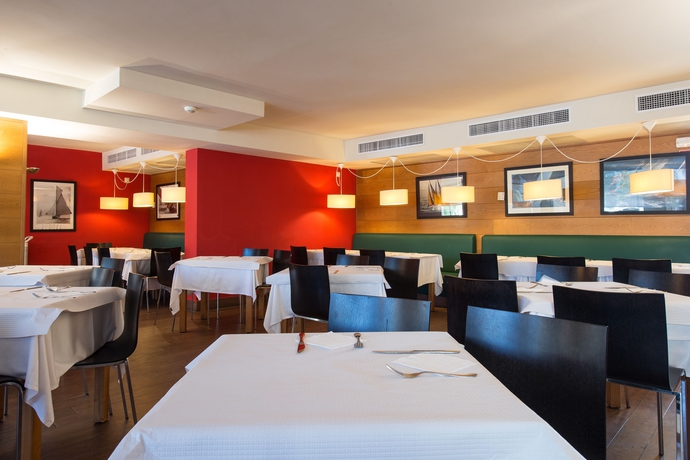 Imagen del bar/restaurante del Apartamentos Hotel Bellevue Club. Foto 7