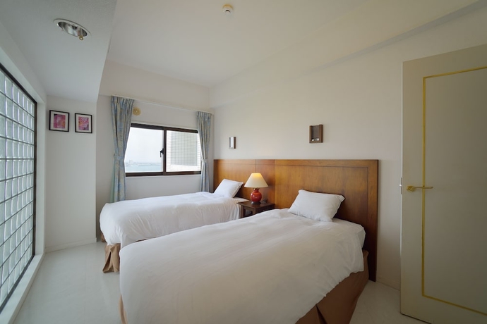 Imagen de la habitación del Apartamentos Hotel Royal Marine Palace Ishigakijima. Foto 6