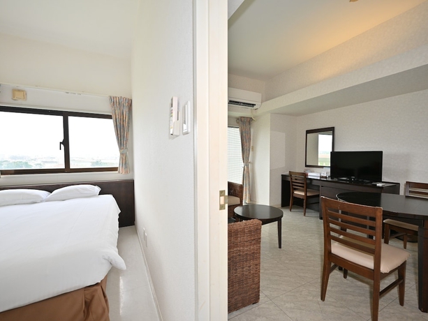 Imagen de la habitación del Apartamentos Hotel Royal Marine Palace Ishigakijima. Foto 8
