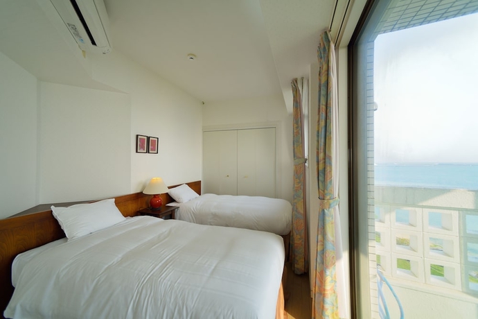 Imagen de la habitación del Apartamentos Hotel Royal Marine Palace Ishigakijima. Foto 12