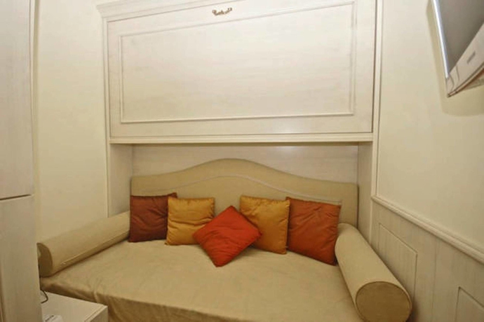 Imagen de los interiores del Apartamentos House and The City - Colosseo. Foto 13