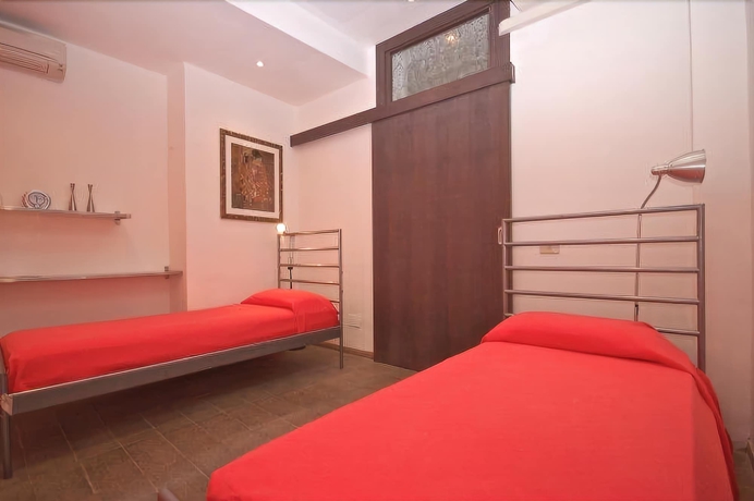 Imagen de la habitación del Apartamentos House and The City - Trastevere. Foto 2