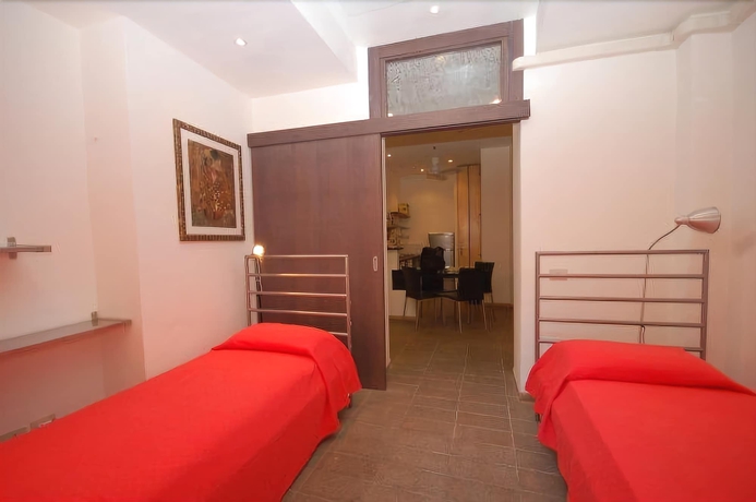 Imagen de la habitación del Apartamentos House and The City - Trastevere. Foto 4