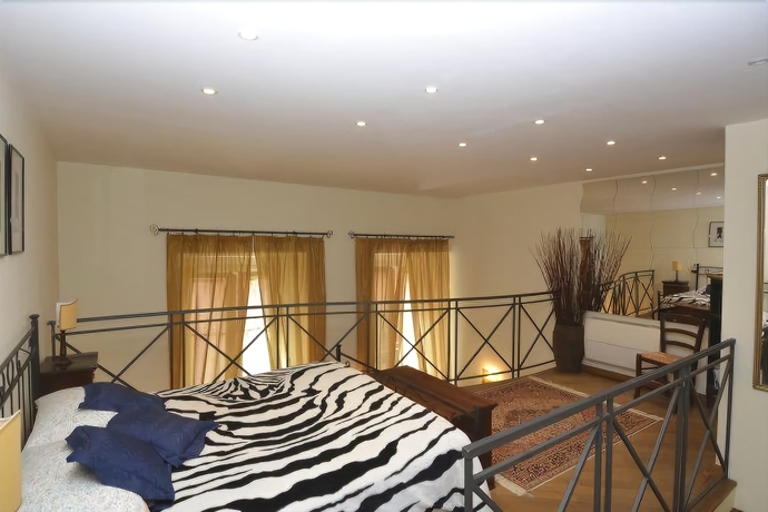 Imagen de la habitación del Apartamentos House and The City - Trastevere. Foto 8