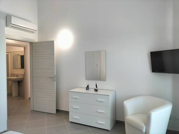 Imagen de la habitación del Apartamentos Icaro, Sant'Agata di Militello. Foto 19