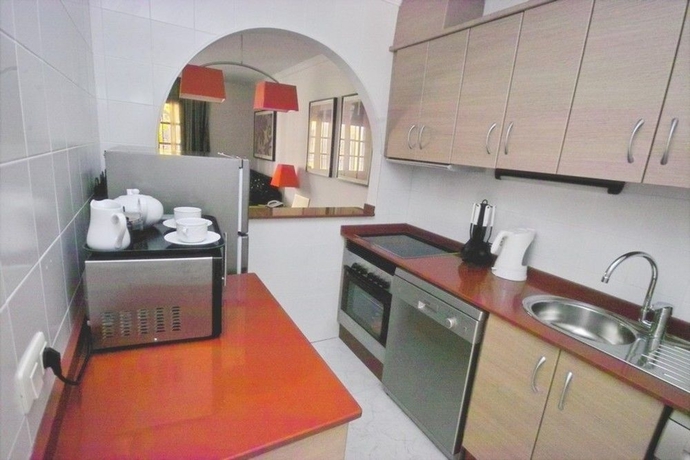 Imagen de la habitación del Apartamentos Infiniti Beach Resort. Foto 10