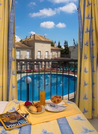 Imagen de la piscina del Apartamentos Interpass Golf Playa Country Club. Foto 11