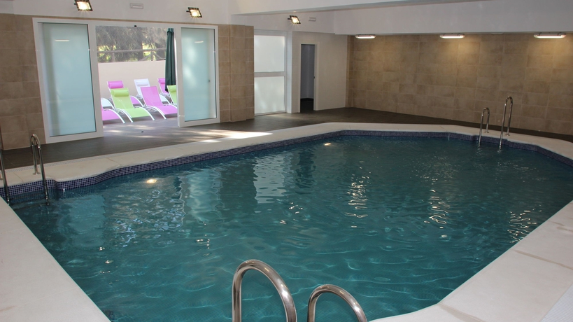 Imagen de la piscina del Apartamentos Interpass Golf Playa Country Club. Foto 13