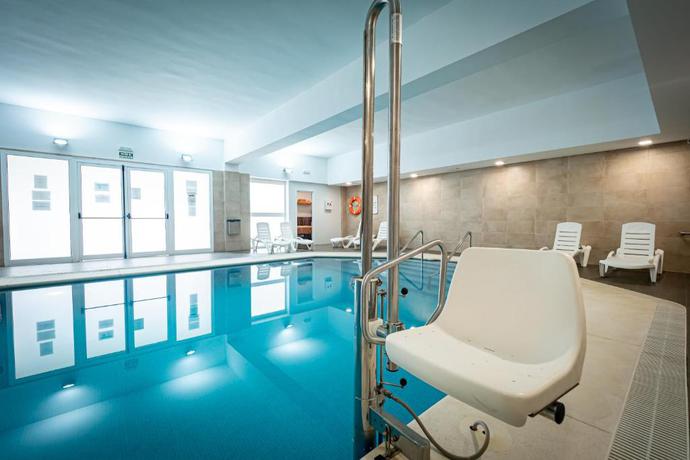 Imagen de la piscina del Apartamentos Interpass Golf Playa Country Club. Foto 14