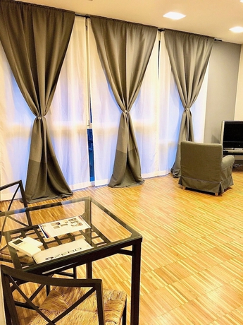 Imagen de la habitación del Apartamentos Isola Apartments. Foto 5