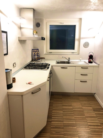 Imagen de la habitación del Apartamentos Isola Apartments. Foto 16