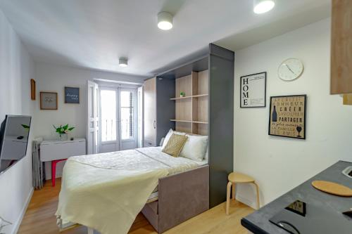 Imagen de la habitación del Apartamentos JAP Preciados. Foto 4