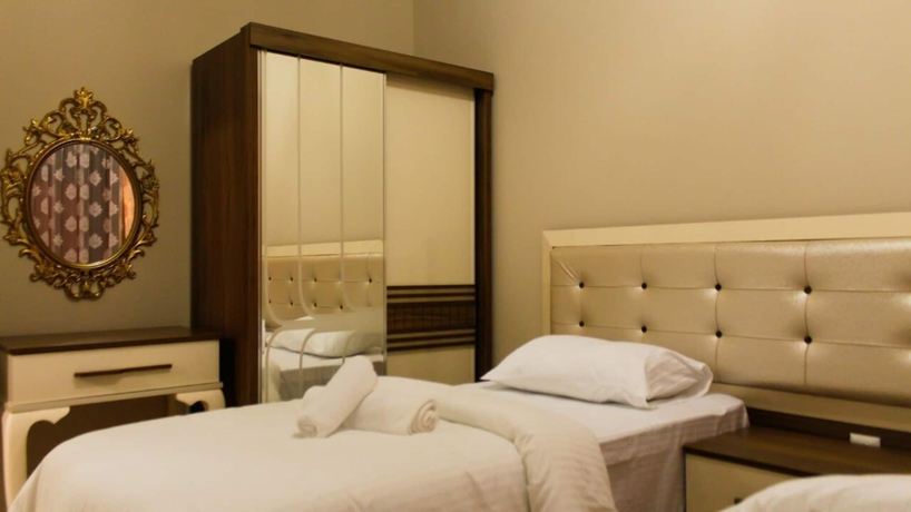 Imagen de la habitación del Apartamentos Julia Domna Apartments. Foto 14