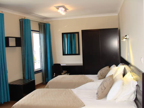 Imagen de la habitación del Apartamentos Kósmos. Foto 3