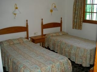 Imagen de la habitación del Apartamentos LAS ORQUIDEAS. Foto 9