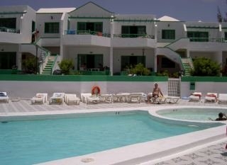 Imagen de la piscina del Apartamentos LAS ORQUIDEAS. Foto 18