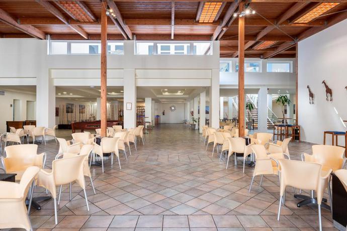 Imagen del bar/restaurante del Apartamentos LIVVO Morromar. Foto 5