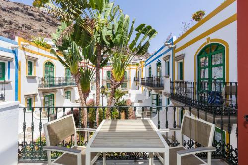 Imagen de la habitación del Apartamentos LIVVO Puerto de Mog&aacute;n, Playa de Mog&aacute;n. Foto 9