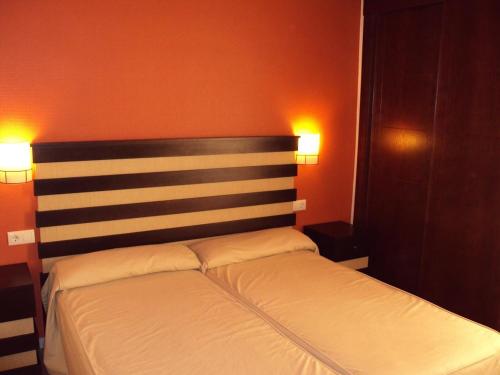 Imagen de la habitación del Apartamentos La Buganvilla. Foto 6