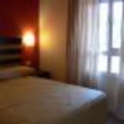 Imagen de la habitación del Apartamentos La Buganvilla. Foto 8