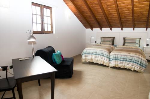 Imagen de la habitación del Apartamentos La Casa Verde. Foto 11