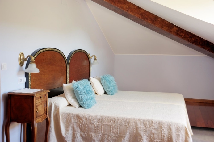 Imagen de la habitación del Apartamentos La Casona De La Roza. Foto 7