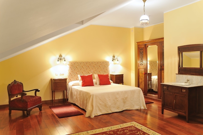 Imagen de la habitación del Apartamentos La Casona De La Roza. Foto 10