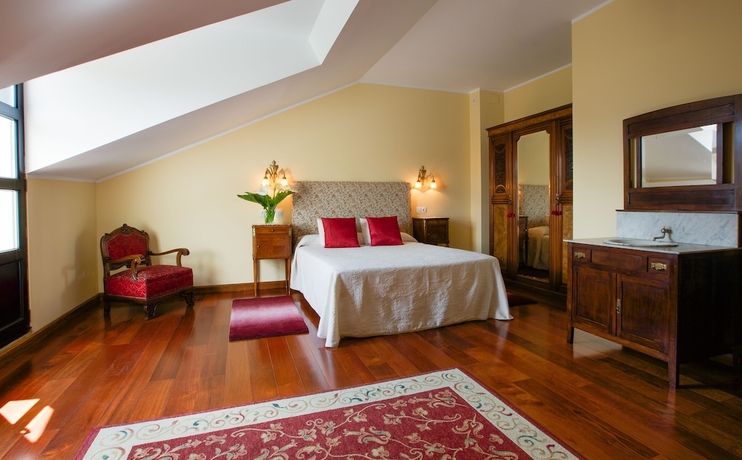 Imagen de la habitación del Apartamentos La Casona De La Roza. Foto 15