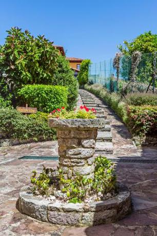 Imagen de los exteriores del Apartamentos La Casona de Vidiago. Foto 8