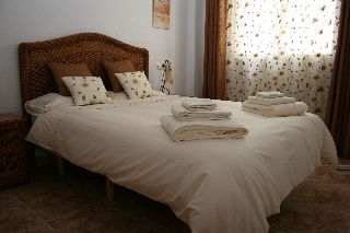 Imagen de la habitación del Apartamentos La Cinuelica. Foto 6