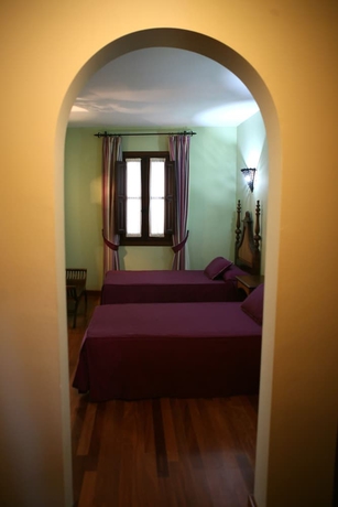 Imagen de la habitación del Apartamentos La Colegiata De Ronda. Foto 7