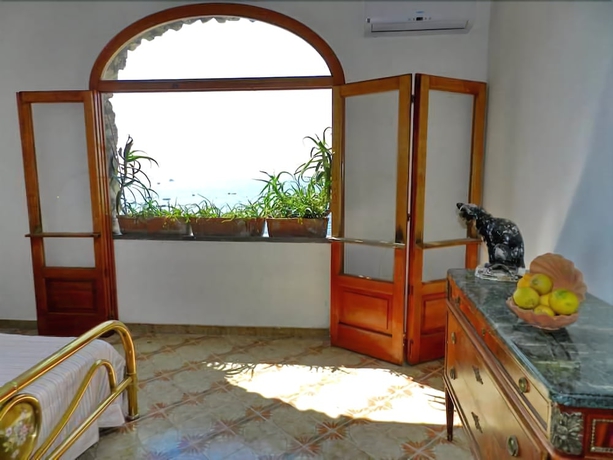 Imagen de la habitación del Apartamentos La Dolce Vita Residence, Positano. Foto 15