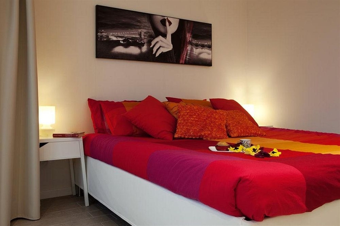 Imagen de la habitación del Apartamentos La Farina Apartments. Foto 9