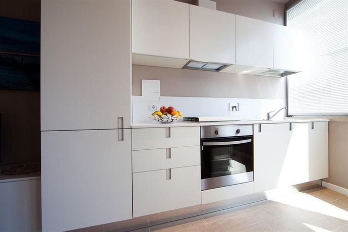 Imagen de la habitación del Apartamentos La Farina Apartments. Foto 12