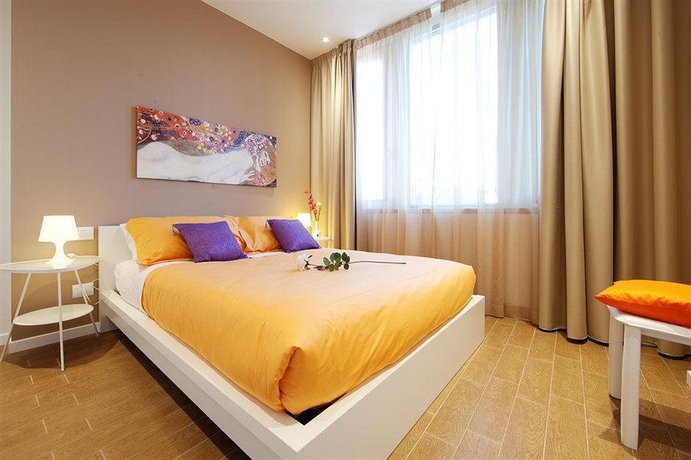 Imagen de la habitación del Apartamentos La Farina Apartments. Foto 13