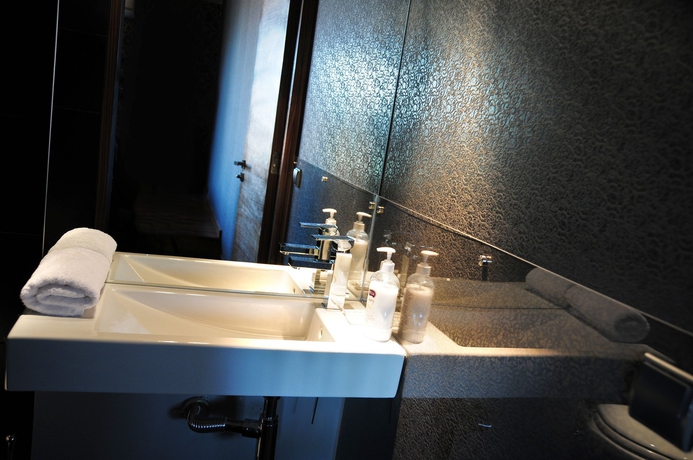 Imagen de la habitación del Apartamentos La Gioia Chic Angel. Foto 3