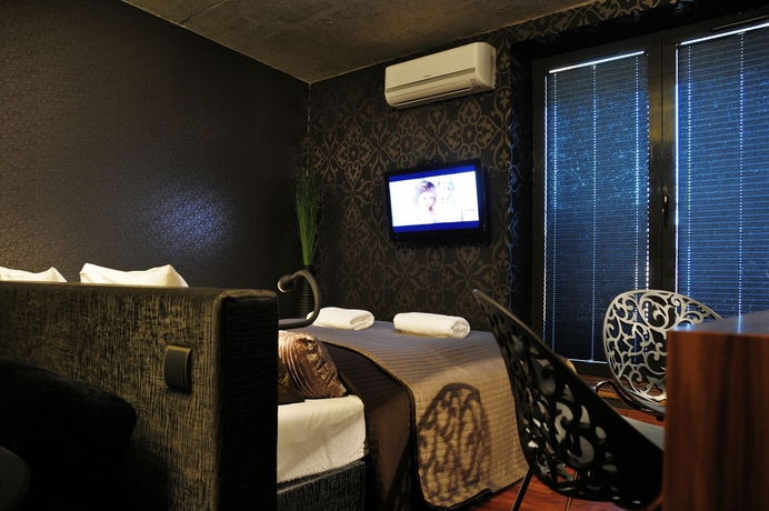 Imagen de la habitación del Apartamentos La Gioia Chic Angel. Foto 8