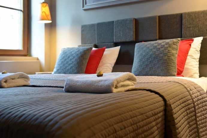 Imagen de la habitación del Apartamentos La Gioia Grey Stylish Apartments. Foto 2