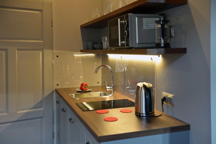 Imagen de la habitación del Apartamentos La Gioia Grey Stylish Apartments. Foto 4