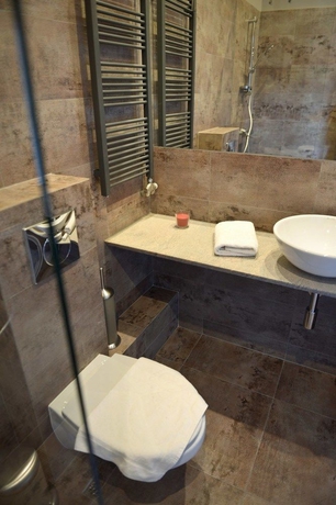 Imagen de la habitación del Apartamentos La Gioia Grey Stylish Apartments. Foto 7