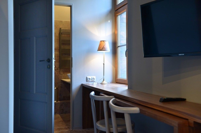 Imagen de la habitación del Apartamentos La Gioia Grey Stylish Apartments. Foto 9