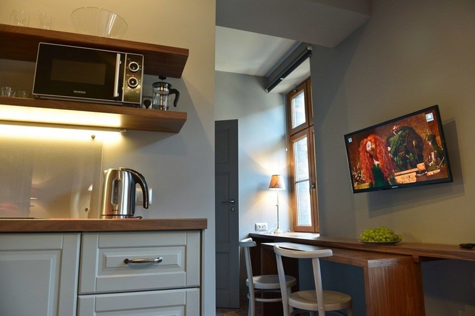 Imagen de la habitación del Apartamentos La Gioia Grey Stylish Apartments. Foto 10