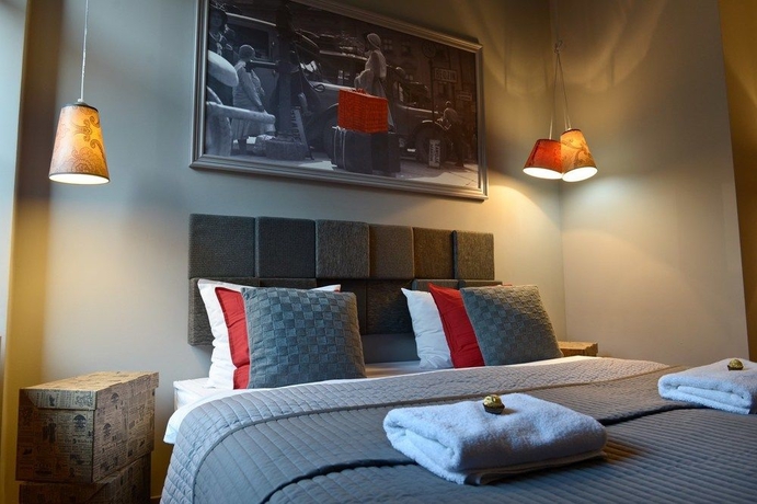 Imagen de la habitación del Apartamentos La Gioia Grey Stylish Apartments. Foto 11