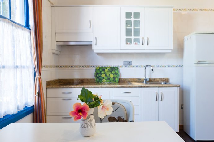 Imagen de la habitación del Apartamentos La Hacienda Grande. Foto 11