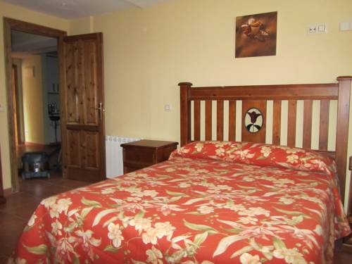 Imagen de la habitación del Apartamentos La Higar. Foto 2