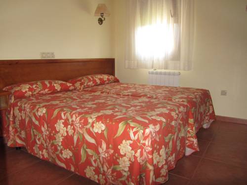 Imagen de la habitación del Apartamentos La Higar. Foto 11