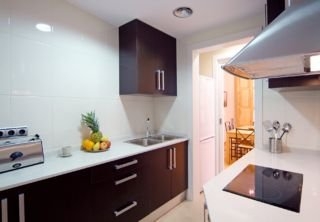 Imagen de la habitación del Apartamentos La Muralla, Barrio G&oacute;tico. Foto 4