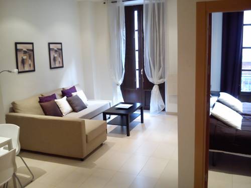 Imagen de la habitación del Apartamentos La Perla Reyes Catolicos Living. Foto 3