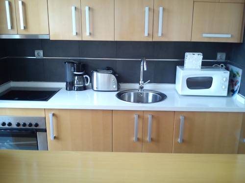 Imagen de la habitación del Apartamentos La Perla Reyes Catolicos Living. Foto 4